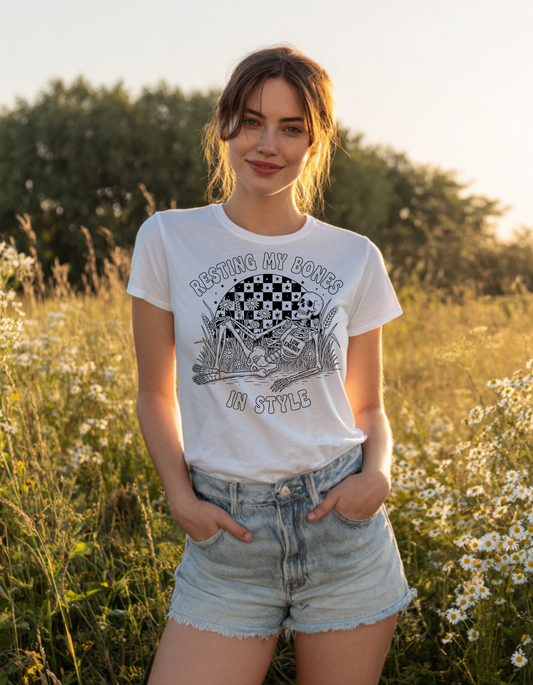 Resting My Bones in Style Women’s T-Shirt – Funny Skeleton Graphic Tee – Relaxed Vintage Vibes, Soft 100% Cotton Casual Top